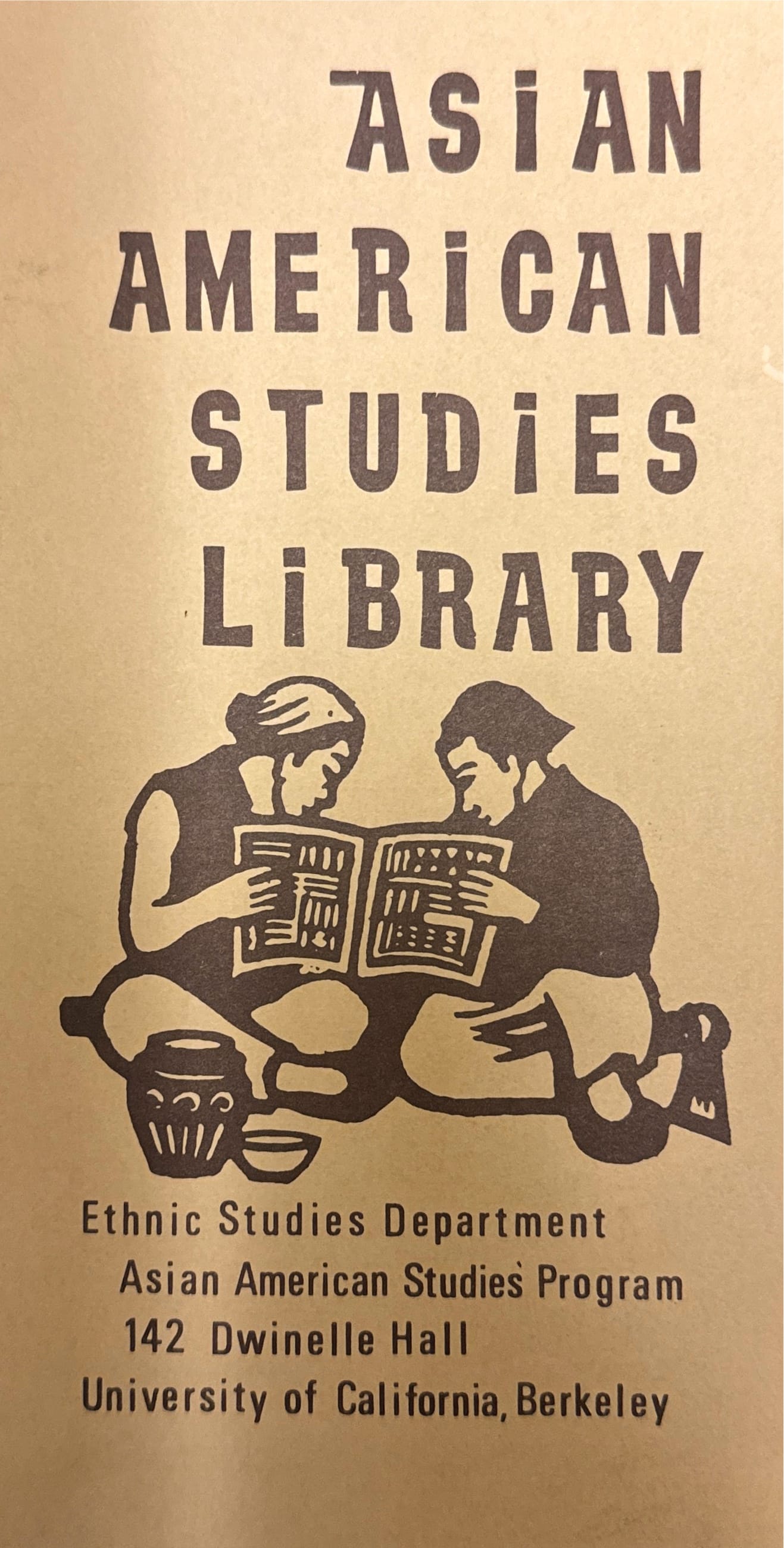A poster with a light tan background with a woodcut of two people holding open a pamphlet together and reading it. The poster reads: Asian American Studies Library, Ethnic Studies Department, Asian American Studies Program, 142 Dwinelle Hall, University of California, Berkeley.